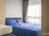 ห้องนอนตกแต่งด้วยผ้าม่านและวอลเปเปอร์ 04 @ iCondo Green Space สุขุมวิท 77