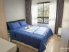 ห้องนอนตกแต่งด้วยผ้าม่านและวอลเปเปอร์ 06 @ iCondo Green Space สุขุมวิท 77