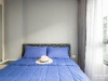 ห้องนอนตกแต่งด้วยผ้าม่านและวอลเปเปอร์ 03 @ iCondo Green Space สุขุมวิท 77