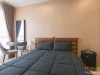 ห้องนอน กับผ้าม่านสีน้ำตาล 04 @ Ideo Mobi สุขุมวิท-อีสท์เกต