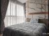 ห้องนอนใหญ่ตกแต่งด้วยผ้าม่าน สีเทา 01 @ Ideo O2