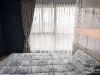 ห้องนอนใหญ่ตกแต่งด้วยผ้าม่าน สีเทา 05 @ Ideo O2