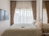 ห้องนอนตกแต่งด้วยผ้าม่านจีบ สีครีม 03 @ Kawa Haus สุขุมวิท 77