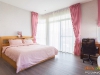 ห้องนอนใหญ่ ตกแต่งด้วยผ้าม่านโทนสีชมพู 02 @ มัณฑนา ราชพฤกษ์-สะพานมหาเจษฎาบดินทร์ฯ