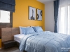 ห้องนอนใหญ่ตกแต่งด้วยผ้าม่านลอน สีน้ำเงิน 01 @ Notting Hill สุขุมวิท 105