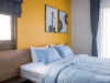 ห้องนอนใหญ่ตกแต่งด้วยผ้าม่าน สีน้ำเงิน 02 @ Notting Hill สุขุมวิท 105