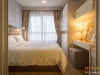 ห้องนอนตกแต่งด้วยผ้าม่าน สีครีม 01 @ The Tempo Grand สาทร-วุฒากาศ