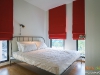 ห้องนอนใหญ่ตกแต่งด้วยผ้าม่าน สีแดง 01 @ Unio สุขุมวิท 72